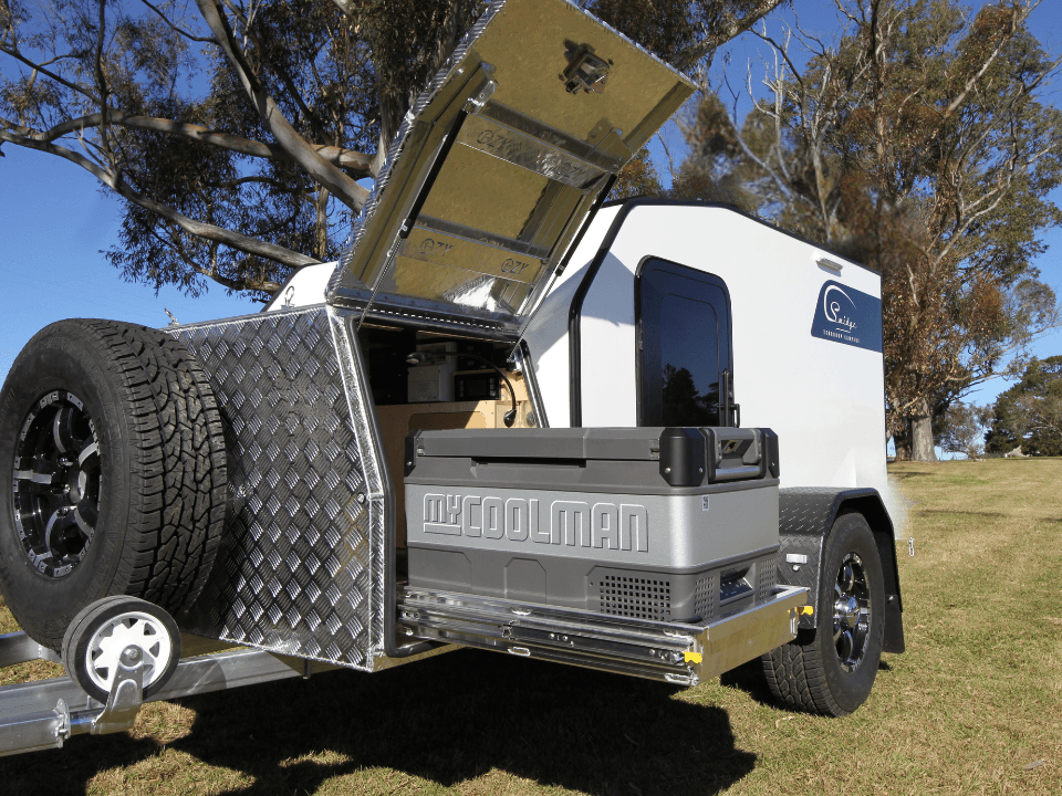 Anvil by Smidge squaredrop off-road camper trailer — rear kitchen open for outdoor cooking at campsite