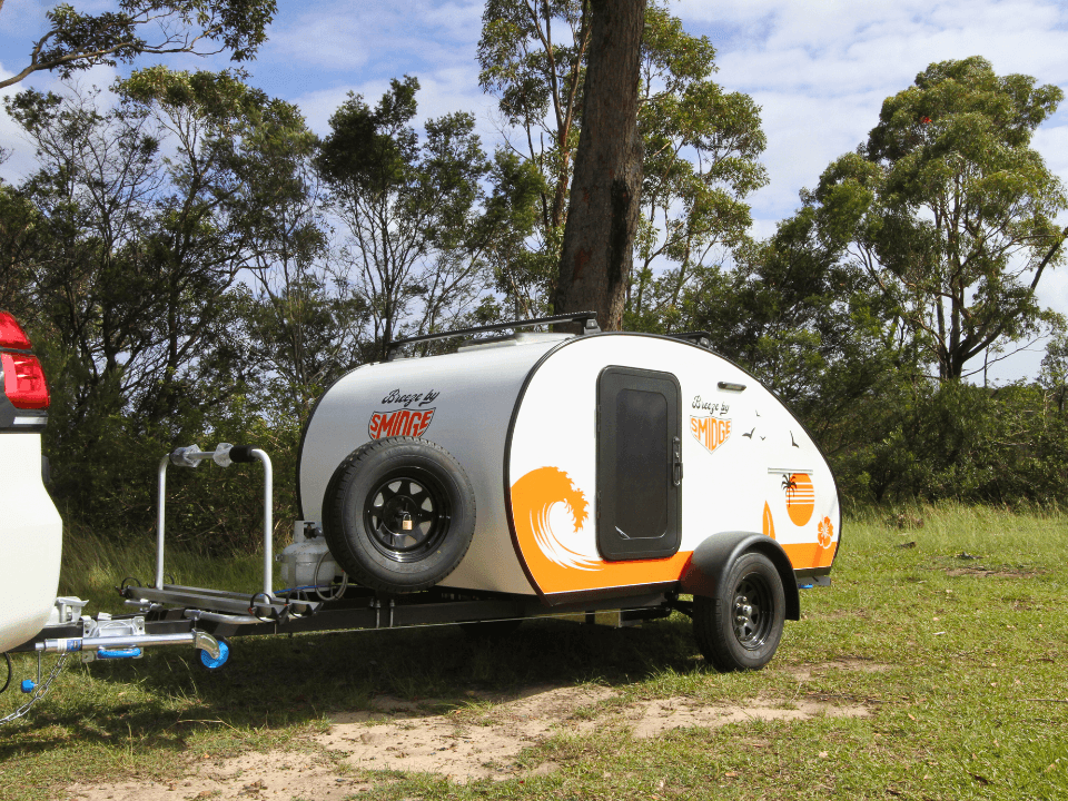 Breeze by Smidge teardrop camper trailer — front quarter right view with retro graphics